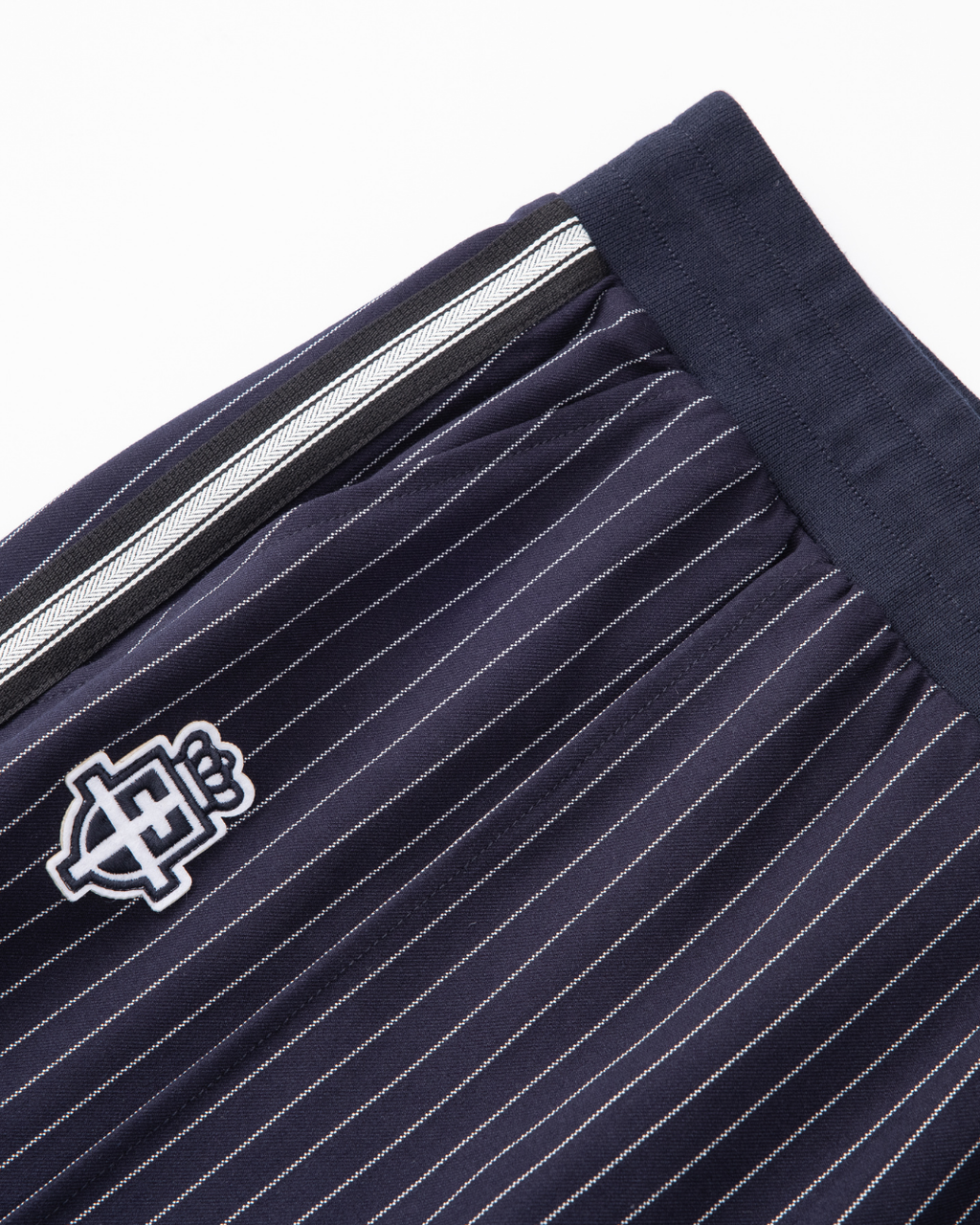 Ultra striped tracksuit bottoms | Midnight blue