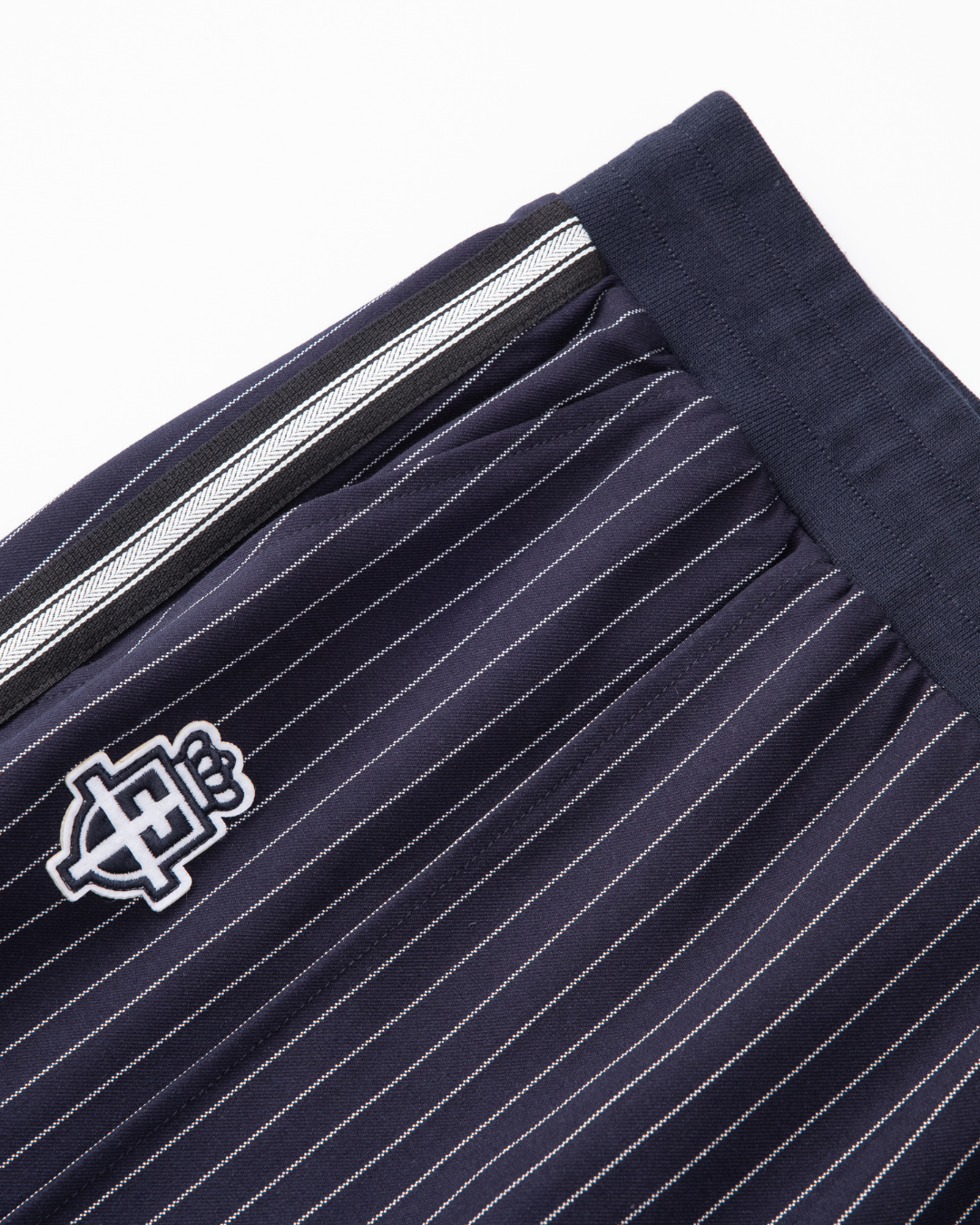 Ultra striped tracksuit bottoms | Midnight blue