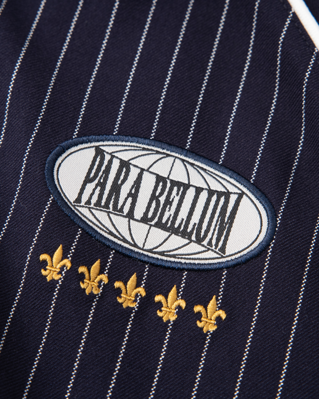 Veste de survêtement Ultra à rayures | Bleu nuit