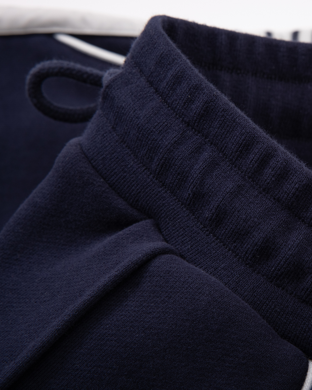 Pantalon de survêtement à bandes | Bleu nuit / Blanc